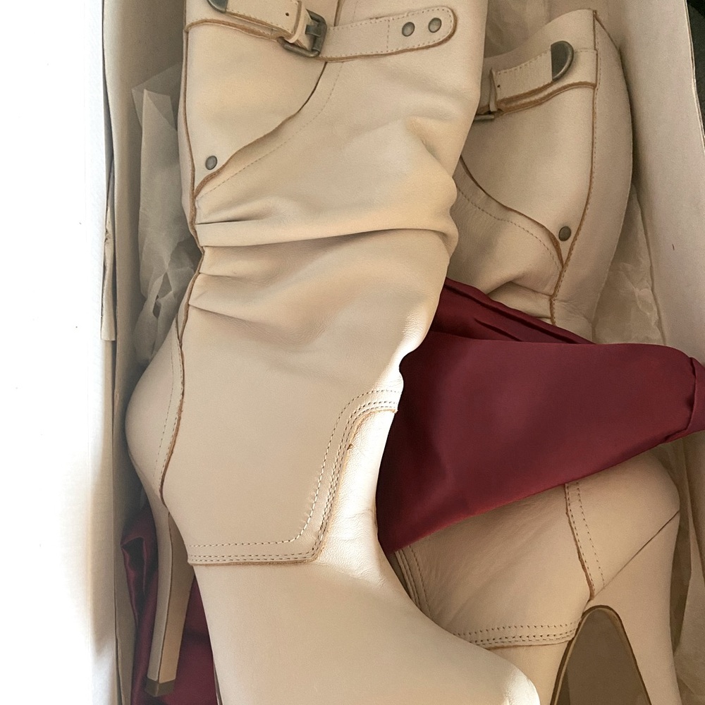 Shi- White/Ivory/Cream Journey’s heeled boots. Great with a cute sweater dress!